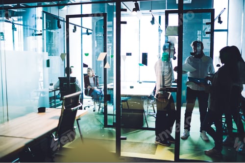 Preview: Work partners standing in meeting room of corporation