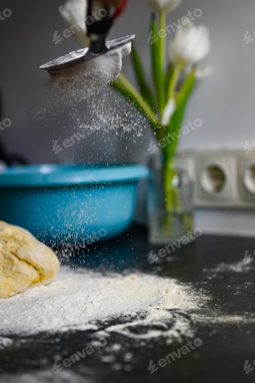 Preview: Flour Sifting onto Dough with Turquoise Bowl