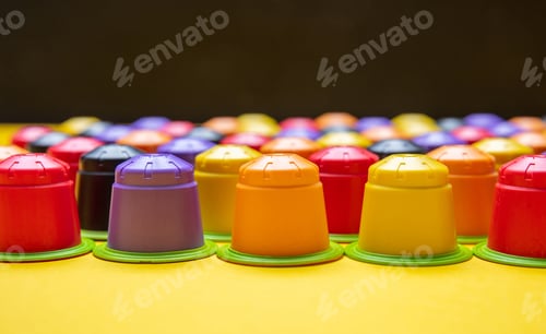 Preview: Coffee espresso capsules, eco friendly, compostable on yellow color background