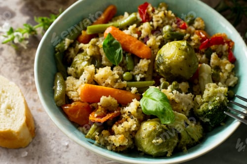 Preview: Healthy proper nutrition. Dietary vegan dish: couscous and vegetables.