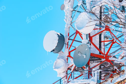 Preview: Communication tower antennas covered in snow