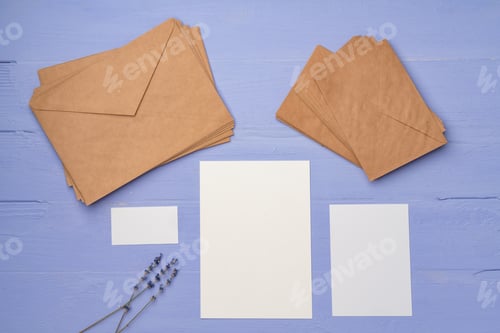 Preview: Handmade paper envelope on lavender wooden table