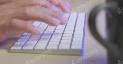 Preview: Working on laptop computer