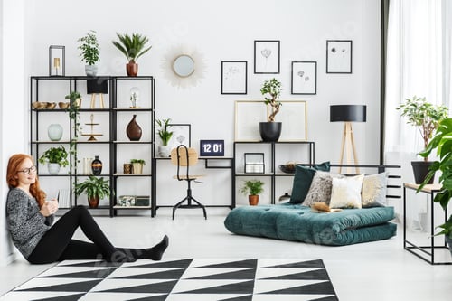 Woman Relaxing in Bright Minimalist Home Interior