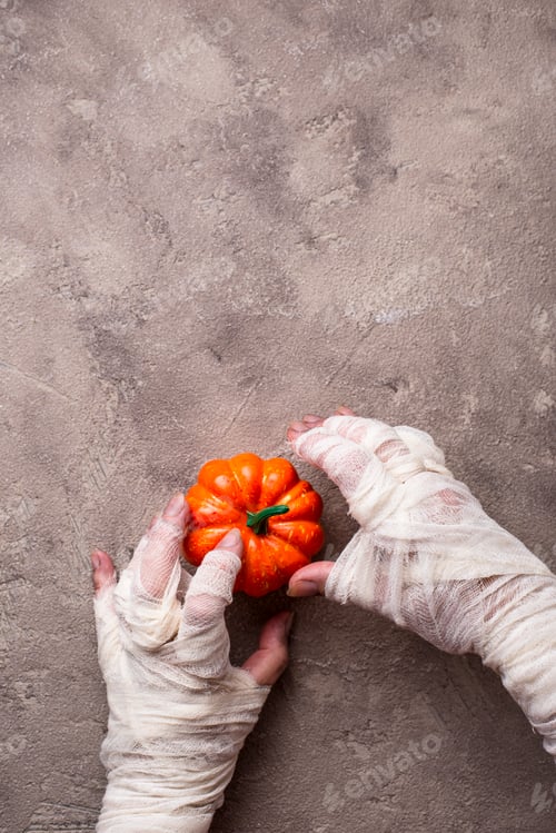 Preview: Halloween background with mummy's hand