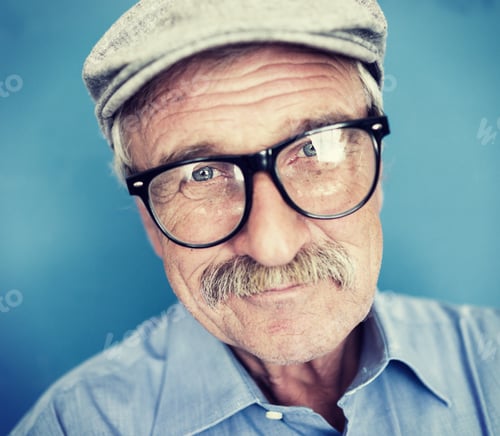 Preview: Portrait Of A Smiling And Confident Senior Good Looking Business Man With Hat