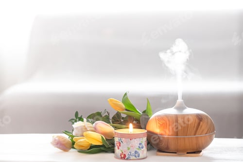 Preview: Aroma oil diffuser lamp on the table .