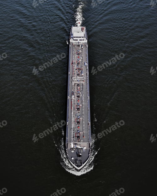 Preview: Vertical shot of a ferry sailing in the ocean