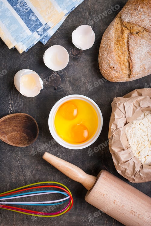 Preview: Baking background with bread, eggshell, flour, rolling pin