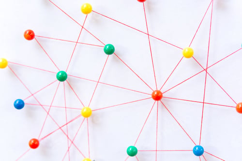 Preview: connection between the two networks. Network simulation on paper linked together by yarn
