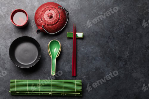 Preview: Japanese tea, empty plate and chopsticks