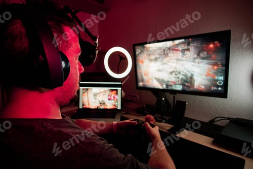 Preview: a gamer playing and streaming live with microphones and cameras