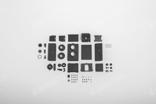 Preview: Top view shot of twin-lens vintage open camera kit pieces isolated on a white background