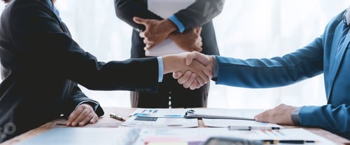 Preview: Business success. Business people handshake agreement confirmed in the investment business.