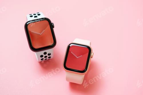 Preview: Seoul - 21.02.2022: Apple Watch on pink background close up, copy space.