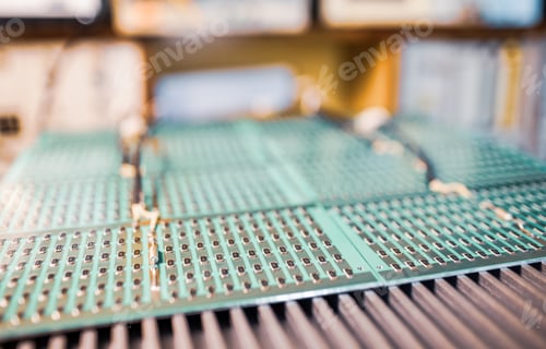 Preview: Close-up side view of a panel of SMD resistors