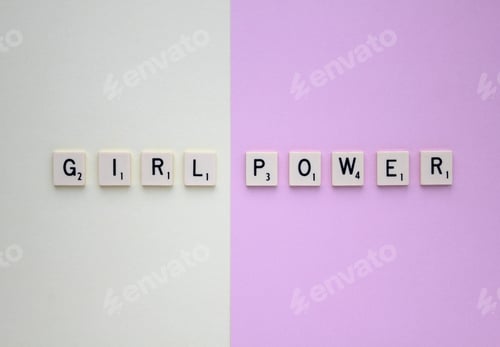 Preview: The words Girl Power spelled out, flat lay style, in Scrabble letters