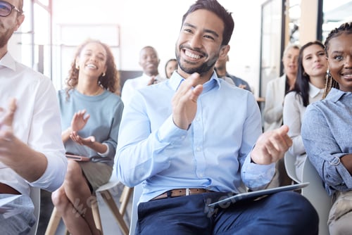 Preview: Cropped shot of a group of businesspeople applauding during a seminar in the conference room