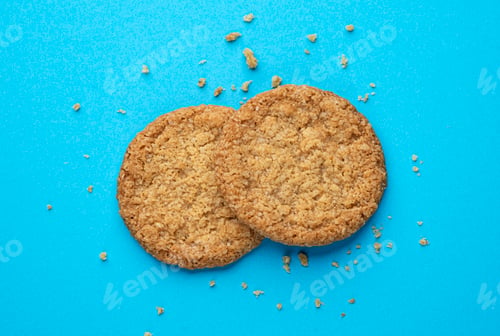 Preview: Two oatmeal cookies, top view with copy space