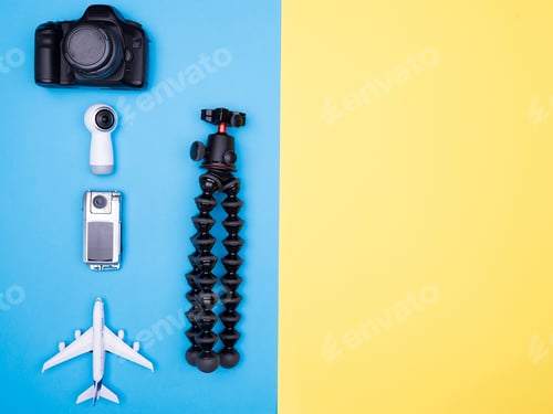Preview: Flat lay top view of plane on yellow background