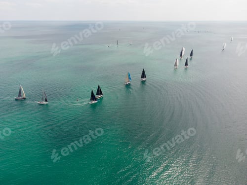 Preview: Aerial view of sailing yachts regatta race on sea