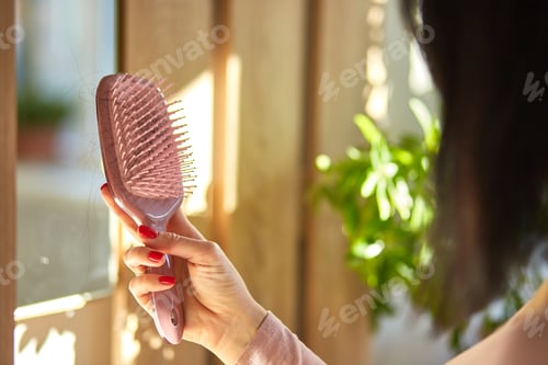 Preview: Problem hair loss concept, losing hair on hairbrush