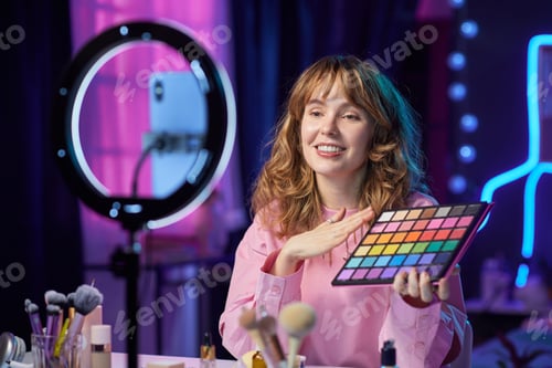 Preview: Smiling Girl Reviewing Make Up