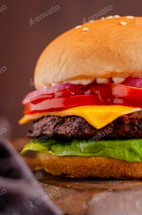 Preview: a burger on a plate with ketchup and lettuce