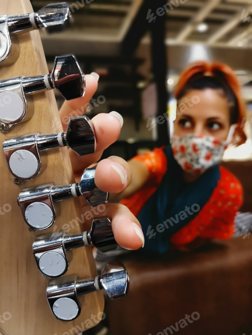 Preview: Female with a protective mask, isolated at home during the coronavirus pandemic