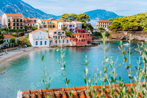 Preview: Assos village in Kefalonia, Greece. Turquiose bay, quite beach and colored traditional houses. Red