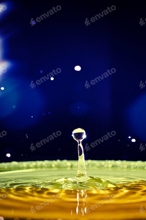 Preview: The water drop with interesting colorful blurred background