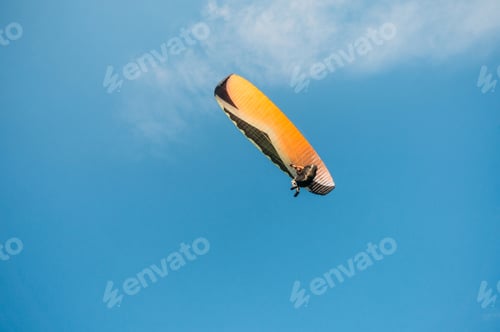 Preview: Parachutist flying in blue clear sky, Crimea, Ukraine, May 2013