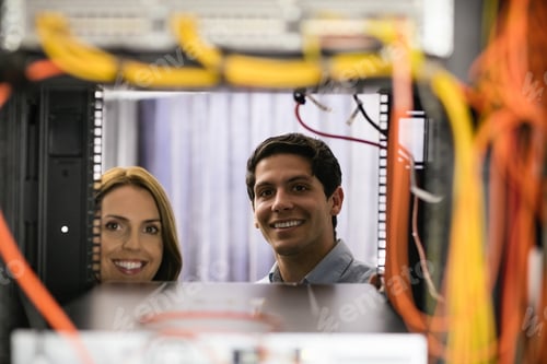 Preview: Team Of Technicians Working Together On Servers At The Data Centre
