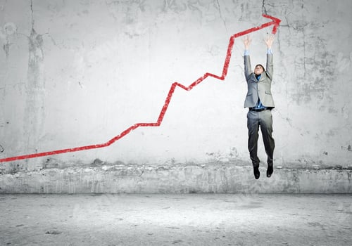 Preview: Image Of Young Businessman Jumping Above Graph