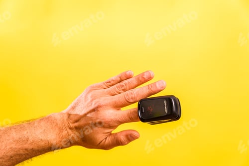 Preview: An adult is monitored for oxygen saturation and pulse with a homemade oximeter