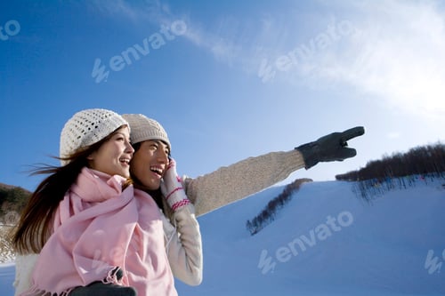 Preview: Young couple together looking at the view