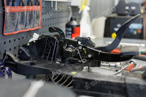 Preview: Repair of car pedals in a car service station.