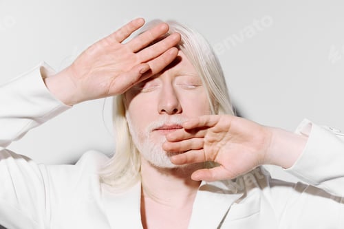Preview: Portrait of a person with long white hair and pale skin, hands raised in a dramatic pose against a
