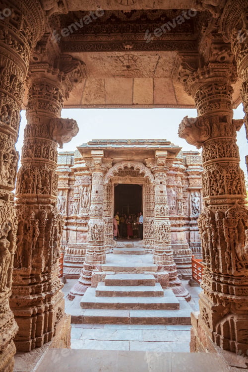 Preview: Beautiful shot of old stone arch building with stairs in Dilwara Temples in Mount Abu, India