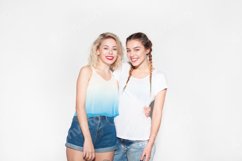 Preview: Two Young Women Smiling in Studio