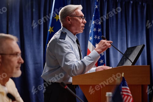 Preview: Politician performing at military conference