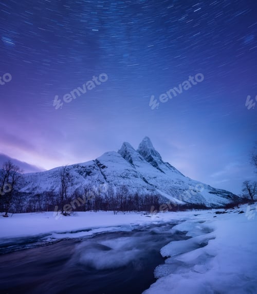 Preview: Mountains and starry night sky, Senja islands, Norway. Winter landscape with night sky.