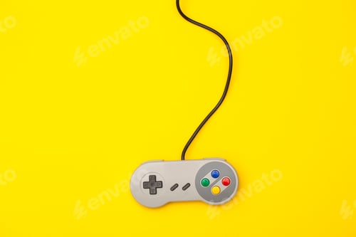 Preview: Retro computer gaming controller on a yellow background