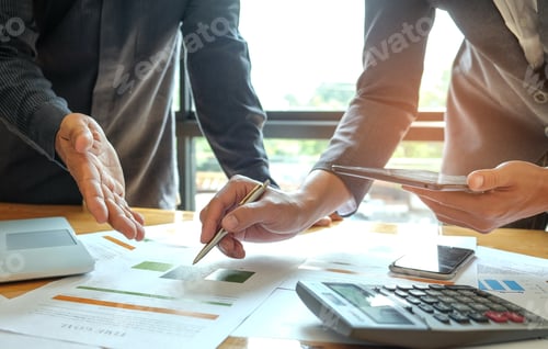 Preview: Two office workers are analyzing data,Business concepts.