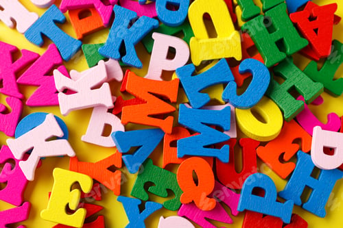 Preview: colored letters of the alphabet on a yellow background