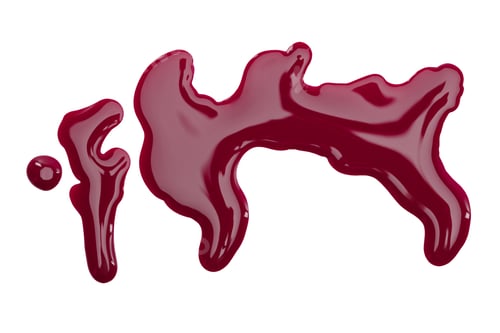 Preview: close up view of burgundy nail polish spills isolated on white