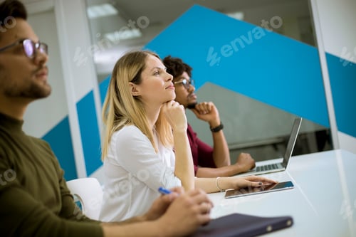 Preview: Young students sitting in the classroom