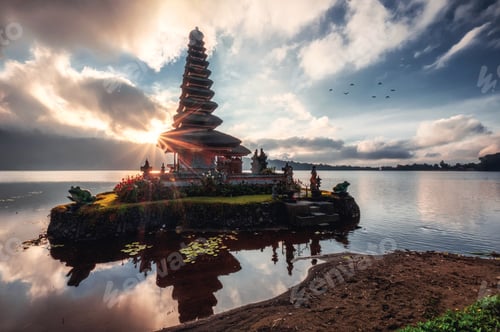 Preview: Sunrise shining on ancient temple of Pura Ulun Danu Bratan on Bratan Lake at Bali