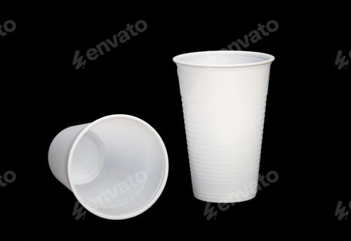 Preview: Closeup shot of plastic cups on a black background