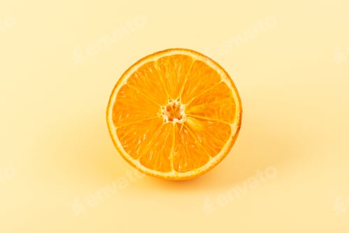 Preview: a front view orange slice fresh mellow juicy ripe isolated on the cream colored background citrus